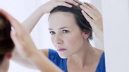 ریزش مو در زنان علت و درمان آن